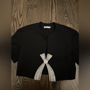 AREA V Neck with a crystal accents size M never worn with tag